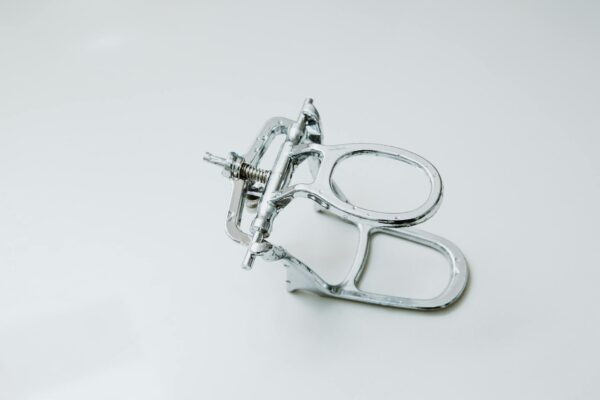 Metal dental equipment on white background